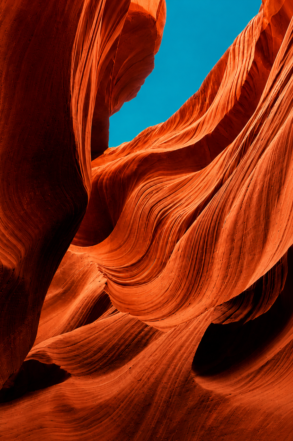 Cover art for Issue One of Resonance, sculpted orange slot canyon walls beneath a blue sky